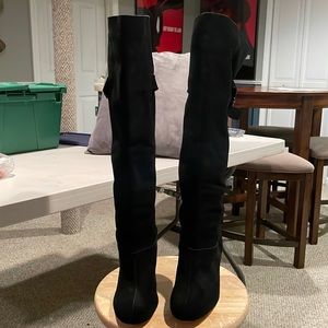 Restricted Black Knee High Boots Size 8.  Lightly used.